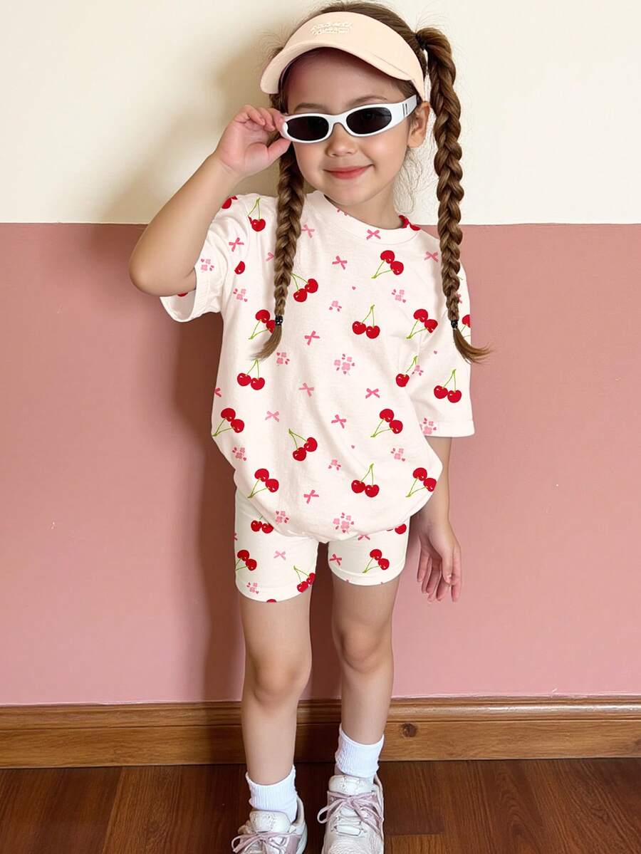 SHEIN 2pcs/Set Young Girl Casual Loose Fit Cherry, Floral, Bow Print Short Sleeve Round Neck T-Shirt And Skinny Cycling Shorts, Suitable For Spring/Summer Daily, Home, School, Outings - Multicolor - View 1