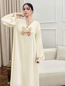 Yasmyna رمضان فستان أنيق بأكمام طويلة وياقة ربطة عنق مزين بترتر على شكل فراشة بطراز عربي - لون مشمشي - مشاهدة 6