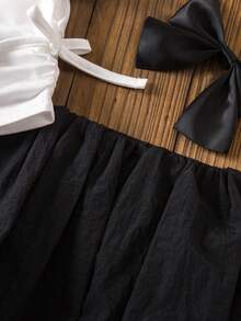 SHEIN 2pcs Baby Girl Cute Knit Bow Tie Short Sleeve T-Shirt & Elastic Waist Black Skirt Set - Black and White - View 6