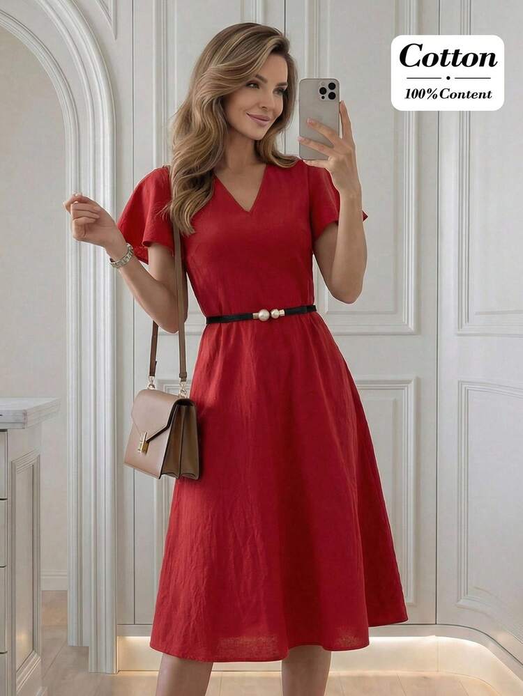 This Elegant Summer Dress For Women Features A Rich Burgundy Color, Exuding A Vibrant Atmosphere Perfectly Suited To The Romantic Mood Of Valentine's Day. The Floral Pattern Is Solid-Color With Pearl Details On The Waist Belt, Showcasing A Refined And Fashionable Style Within Its Simplicity. The Design Includes A V-Neck, Flutter Sleeves, A Cinched Waist, And A Full Skirt, With The Belt Accentuating The Figure. The Relaxed Silhouette Balances Comfort And Elegance. Suitable For Spring And Autumn, It Can Be Paired With Red Rose Accessories To Enhance The Valentine's Day Atmosphere, Or Layered With A Coat For Added Warmth. Perfect For Valentine's Day Dates And Casual Gatherings, This Dress Conveys Romance With Its Burgundy Base While Showcasing A Sophisticated And Elegant Style With Its Clean Lines. It's A Versatile And Practical Choice For Any Season.