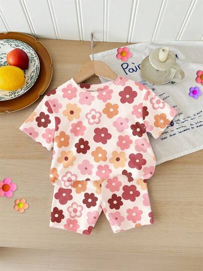 SHEIN Cream White, Cute Sweet Dopamine Pink Floral Print, Baby Girl Casual Comfortable Soft Loose Round Neck Short Sleeve T-Shirt And Skinny Bike Shorts Set, Suitable For Spring/Summer Daily, Home, Vacation, Holiday, Spring Vibes, Summer Vibes, Spring & Summer Outfits , Easy Comfort, Stylish Baby Girl Set, Casual Wear, Kids Floral Graphic Clothes, Spring & Summer Set, New Style, Chill Chill
