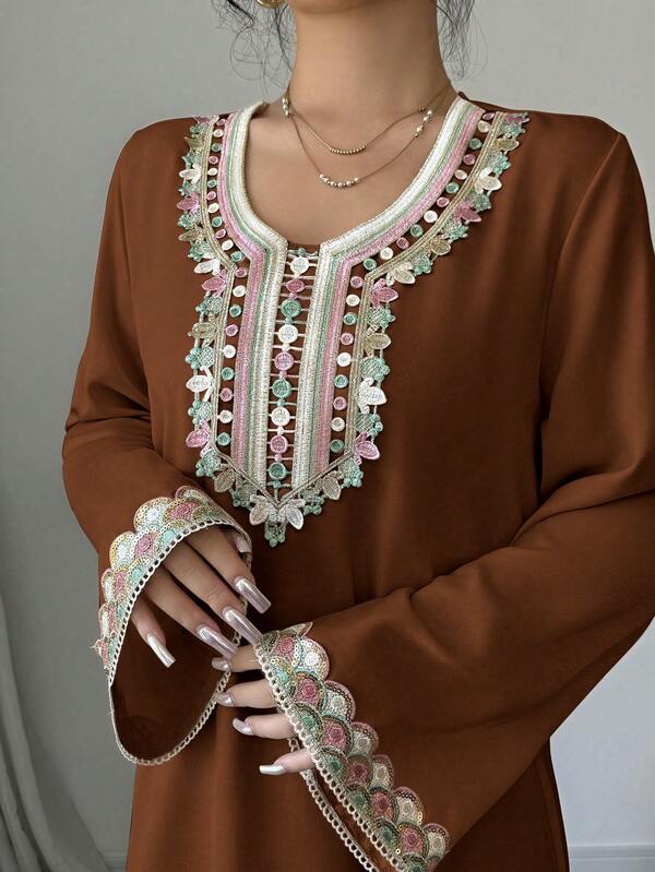 Al Najma Women's Elegant Arabic Style V-Neck Long Sleeve Dress With Applique DecorLong Sleeve V Neck Kaftan Tunic Khaki With Boho Style And Intricate EmbroideryBoho Khaki V Neck Long Tunic With Flare Sleeve And Embroidery Detail For Women