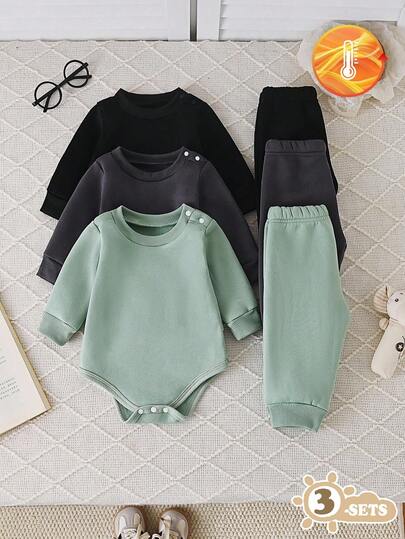 SHEIN Vintaside Kids 男婴纯色圆领长袖连体衣三件套，黑色、白色和灰色可选，时尚简约，图案设计优雅，宽松版型适合各种体型。三件套包含一件连体衣上衣和三条无腰带长裤，适合多种场合：户外玩耍轻松自在；居家休闲舒适；运动灵活；秋冬季穿着皆宜。