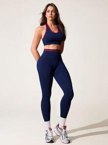 Core Rhythm Bộ đồ thể thao không đường may màu xanh hải quân dành cho nữ, gồm áo tank top ngắn cổ yếm và quần legging. - Màu xanh hải quân - Xem 4