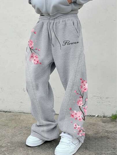 Manfinity EMRG Men's Grey Heather Pink Cherry Blossom Flower Letter Print Sweatpants | Spring To Summer Y2K Streetwear Sakura Floral Branch Graphic Joggers | Vintage Japanese Style Botanical Petal Drawstring Elastic Waist Long Pants | Urban Casual Loose Fit Wide Leg Trousers Holiday Vacation Wear | Soft Breathable Comfortable Daily Outdoor Sports Activewear,Men's Casual Everyday Commute Vacation Style Cherry Blossom Letter Print Drawstring Waist Loose Wide Leg Sweatpants Cherry Blossom Sweatpants Grey Sweatpan