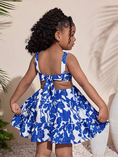 Vestido de verano nuevo de gasa azul con estampado floral y lazo hueco en la espalda para niña, adecuado para la playa, vacaciones y viajes al aire libre