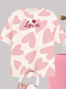 两件套少女休闲宽松圆领短袖上衣，甜美糖果粉色，抽象爱心吐司纹理印花，搭配修身骑行短裤，适合春夏日常穿着、外出、居家、度假、情人节等场合。 - 彩色 - 查看 4