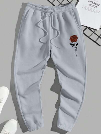 EURMUSE Katoenen joggingbroek voor heren met bloemenprint, zakken en trekkoord in de taille.