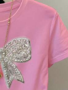 休闲简约蝴蝶结水钻图案修身短袖圆领T恤，适合少女、女士穿着，时尚舒适，适合春、夏、秋季穿着。 - 粉色 - 查看 6