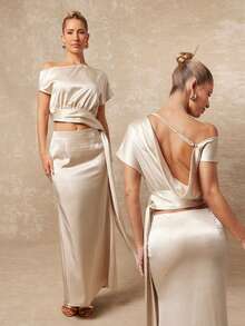 Lumalex 现代简约设计奶油色套装：不对称肩部褶皱腰部露背系带上衣搭配垂坠修身鱼尾裙，采用舒适、光滑、亲肤的缎面面料，优雅得体，适合办公室穿着，也适合多种场合，例如家庭聚会、时尚庆典、春假或暑假，从白天到夜晚，日常休闲穿着皆宜。 - 杏色 - 查看 4