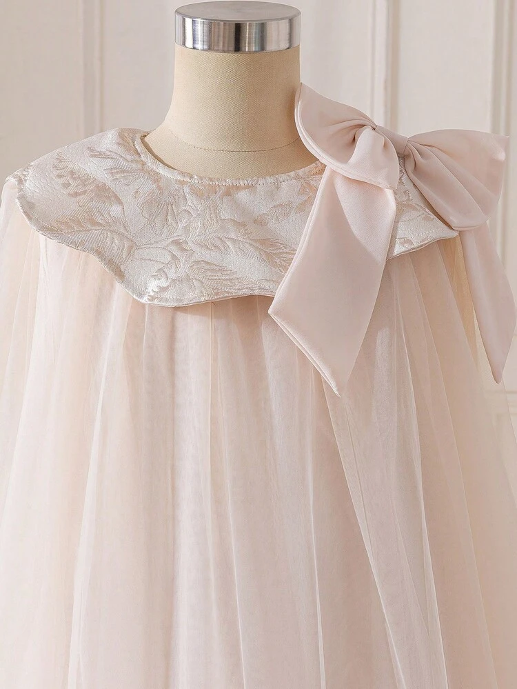 SHEIN Vestido holgado y casual con cuello redondo, sin mangas y corte evasé para niña preadolescente, con decoración de flor 3D y gran lazo - Albaricoque - Añade 8