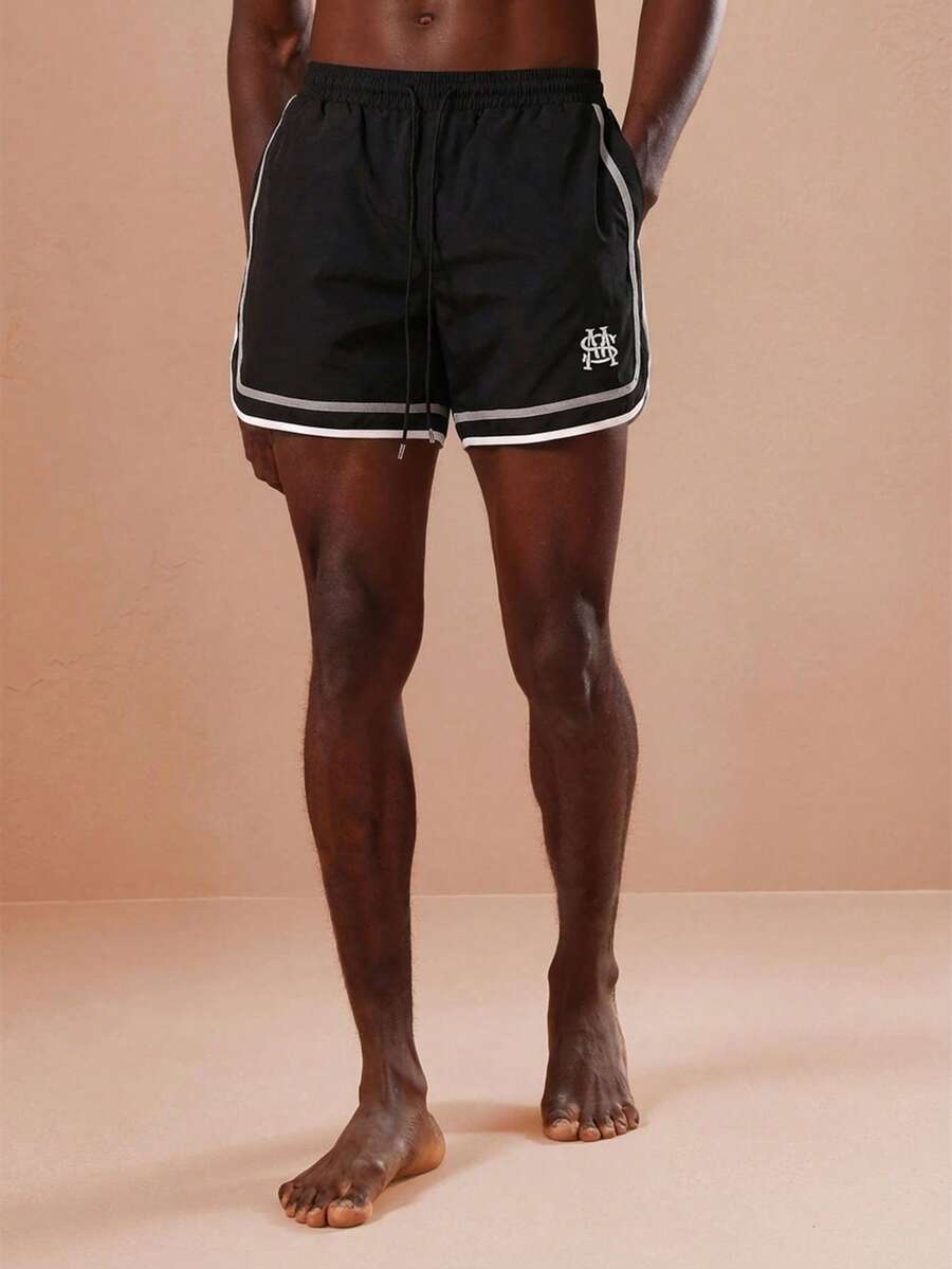 SUMWON Regular Curved Hem Beach Shorts With Contrast Trim And Logo Detail For Summer Swimming Vacation - Black - View 1