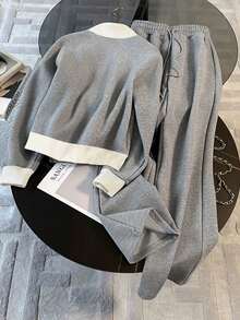 Resyla 宽松立领插肩袖开衫 + 直筒裤（带隐藏口袋）