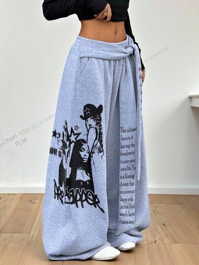 Muchica Carnival Women Look 2026 Women's Stretch Sweatpants With Letter Print And Knotted Design At The Waist, Featuring A Decorative Belt And Printed Leg Openings. These Casual And Versatile Wide-Leg Pants Are Perfect For Everyday Wear.Y2k Women