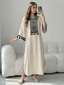 Một chiếc váy truyền thống Ả Rập với họa tiết dành cho bé gái tuổi teen và đường viền đen nhỏ cổ điển, mang phong cách áo choàng Trung Đông, vừa thoải mái, thời trang, thanh lịch và ngọt ngào. Phù hợp cho mùa hè, mặc hàng ngày và các lễ hội, cũng như các lễ hội Trung Đông. - Nhiều màu - Xem 3