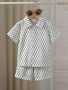 SHEIN Explorewe Bộ áo polo cổ bẻ và quần short màu trơn cho bé trai, thích hợp cho mùa hè. - Đen và trắng - Xem 9