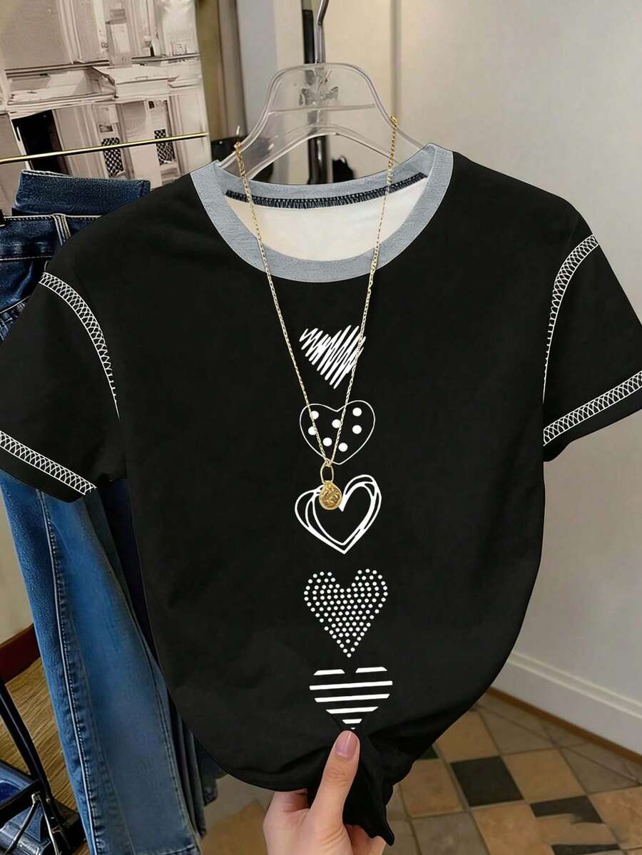 Resyla Áo thun nữ dáng rộng phối màu tương phản họa tiết trái tim, cổ tròn, thích hợp mặc thường ngày vào mùa xuân và mùa hè. - màu đen - Xem 1