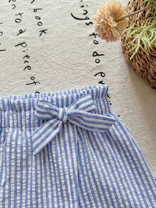SHEIN LMoss Kids 女婴编织条纹纸袋腰短裤，带蝴蝶结装饰，夏季，女婴夏季服装裙，女婴短裤裙，条纹女婴短裤，蓝色女婴短裤，女婴格子短裤 - 彩色 - 查看 4