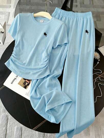 Ein Stücke, Kurzarm, Lässig, versetzter Muster, Frühling und Sommer, Teenager Mädchen Sommer Pendler Set, sportlich und Lässig gerade geschnittene Hose, leichte und bequeme Kurzarm Zwei-Teiler.
