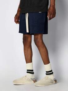 Pantalones cortos de verano casuales con bolsillos laterales lisos, ajuste relajado, cintura con cordón, estilo jogger de entrepierna caída SUMWON - Azul Marino - Ver 1