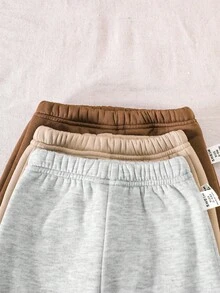 SHEIN Vintaside Kids Conjunto de 3 piezas de body de manga larga de cuello redondo de unicolor para bebé niño, disponible en negro, blanco y gris, estilo de moda, diseño de patrón simple con unicolor para un aspecto premium, corte holgado adecuado para diferentes tipos de Body. El conjunto de 3 piezas incluye una parte superior de body y 3 pantalones largos sin cintura, adecuado para varias ocasiones: adecuado para juegos al aire libre, fácil y libre; adecuado para el ocio en el hogar, cómodo y disfrutable; adecuado para deportes, flexible y activo; - Multicolor - Ver 4