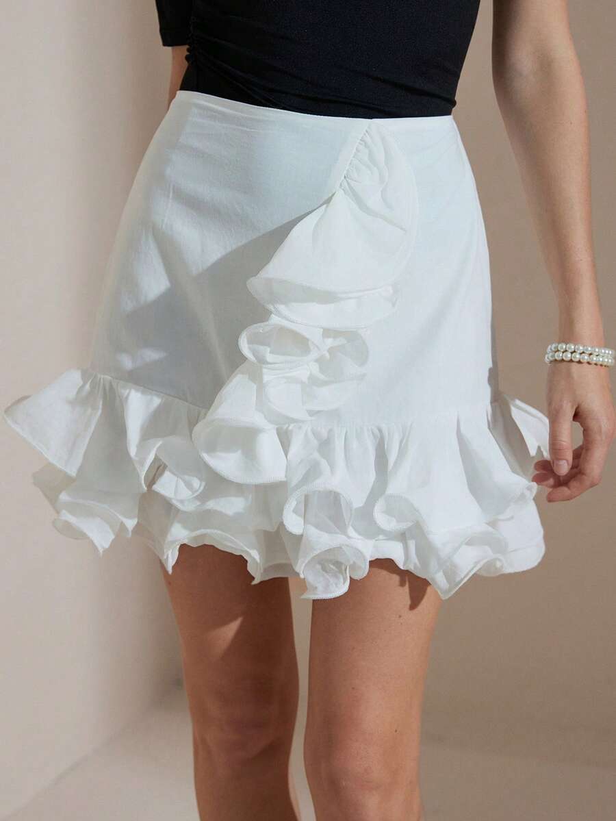 Aveloria Revavyn Jupe élégante de style français, couleur unie, ourlet à volants superposés, design léger et luxueux, pour un look décontracté/vacances pour femmes - Blanc - Voir 1