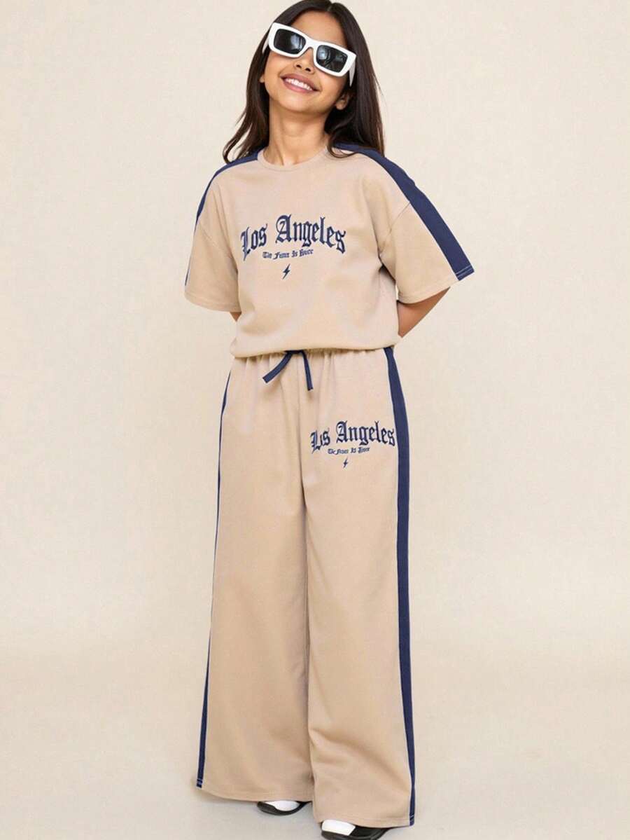 Conjunto de camiseta y pantalones de niña preadolescente de estilo casual holgado, minimalista y cómodo con cuello redondo y diseño de patchwork de colores contrastantes - Albaricoque - Ver 1