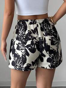 Elenzga Quần short satin nữ họa tiết hoa không đều, cạp chun co giãn, dáng rộng và tôn dáng, thích hợp cho đám cưới, tiệc tùng, các dịp trang trọng, hẹn hò, du lịch, mặc thường ngày, mùa xuân và mùa hè. - Nhiều màu - Xem 2