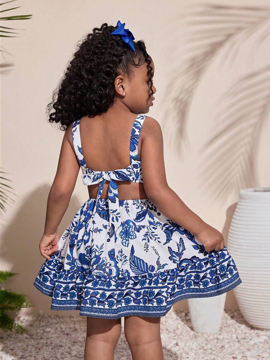 SHEIN Gaun Anak Perempuan Motif Tropis Bercorak Biru dengan Detail Pita dan Lubang-lubang Kecil - Biru - View 1