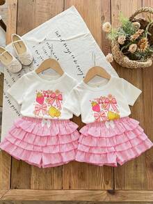 LMoss Kids Conjunto de 2 peças para bebê menina: camiseta de gola redonda em tricô liso e shorts listrados com babados na barra. - Multicolorido - Ver 2