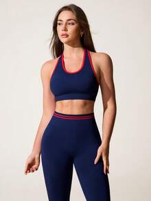 Core Rhythm Bộ đồ thể thao không đường may màu xanh hải quân dành cho nữ, gồm áo tank top ngắn cổ yếm và quần legging. - Màu xanh hải quân - Xem 5