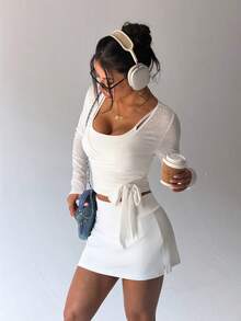 Dewbera 三件套女士运动套装，白色，包括：长袖透视网纱套头外套、带可拆卸胸垫的吊带背心和带开衩和口袋的短裙。适合日常休闲穿着、跑步、瑜伽、健身、网球、高尔夫等运动。春夏秋季皆宜。 - 白色 - 查看 5