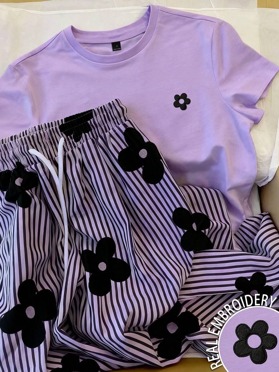 SHEIN Bộ 2 món áo thun ngắn tay cổ tròn in hoa và quần short kẻ sọc dành cho nữ, thích hợp mặc mùa hè. - Màu tím - Xem 1