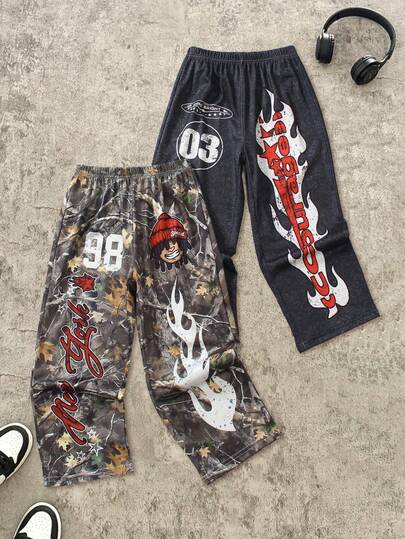 2pcs Young Boy Street Style 03 Flame Print & 98 Camo Cartoon Collaboration Pants, 3D Flame Pattern With Maple Camo And Elastic Waist, SneeBight Brand New York Graphic Character, Hip Hop Workwear Mix, Suitable For Street Fashion, Music Festivals, Daily Wear, Back To School