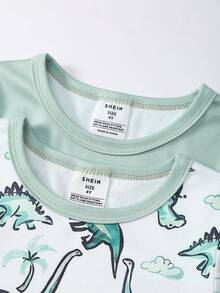 Bộ đồ ngủ ôm sát cho bé trai, in hình khủng long hoạt hình màu xanh lá cây, gồm áo tay ngắn và quần legging, chất liệu mềm mại và thoải mái, thích hợp mặc vào mùa xuân/hè. - màu xanh lá - Xem 8
