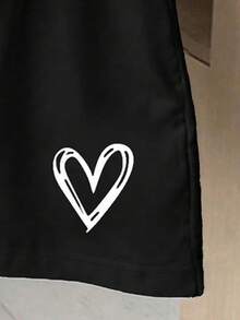 2件套少女休闲黑白爱心印花撞色领短袖上衣和短裤套装，适合春、夏、秋季户外、街头穿着，爱心设计，黑白撞色，舒适日常穿着，经典款 - 黑色 - 查看 3