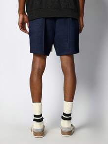 Pantalones cortos de verano casuales con bolsillos laterales lisos, ajuste relajado, cintura con cordón, estilo jogger de entrepierna caída SUMWON - Azul Marino - Ver 4