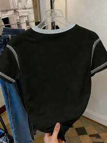 Resyla Áo thun nữ dáng rộng phối màu tương phản họa tiết trái tim, cổ tròn, thích hợp mặc thường ngày vào mùa xuân và mùa hè. - màu đen - Xem 2