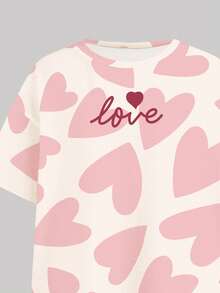 两件套少女休闲宽松圆领短袖上衣，甜美糖果粉色，抽象爱心吐司纹理印花，搭配修身骑行短裤，适合春夏日常穿着、外出、居家、度假、情人节等场合。 - 彩色 - 查看 5