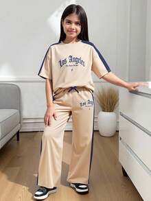 Conjunto de camiseta y pantalones de niña preadolescente de estilo casual holgado, minimalista y cómodo con cuello redondo y diseño de patchwork de colores contrastantes - Albaricoque - Ver 9