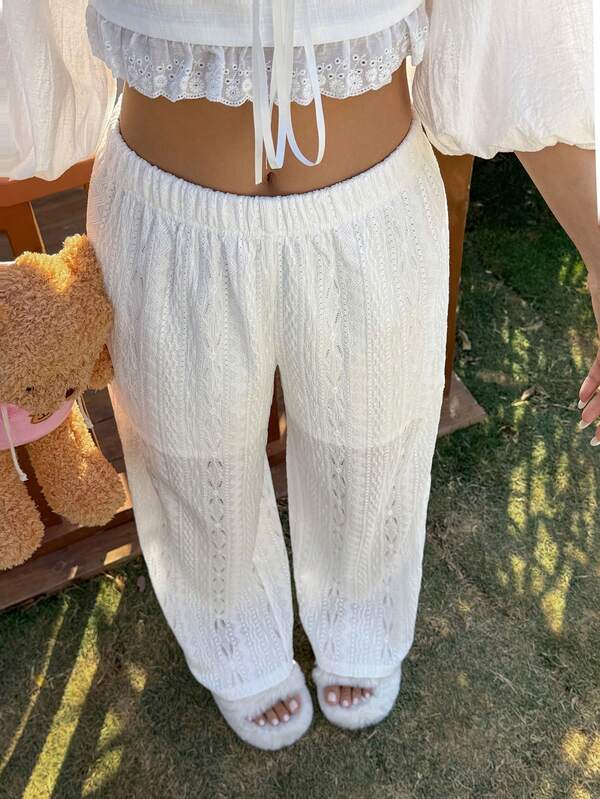 DAZY Pantalones de playa de cintura alta con diseño calado para mujeres