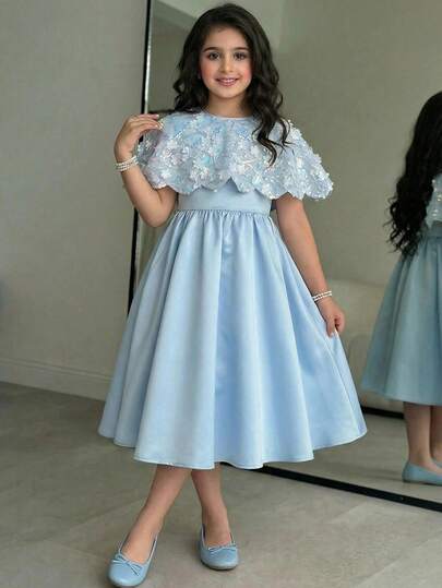 SHEIN Bộ 2 món cho bé gái tuổi teen, gồm váy in hoa và áo khoác cardigan, kiểu dáng công chúa thanh lịch.