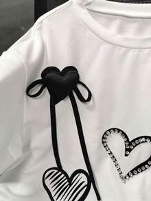 Lyxana Women's Casual Heart Print Rhinestone Bow Decor Short Sleeve T-Shirt, Summer - White - View 3
