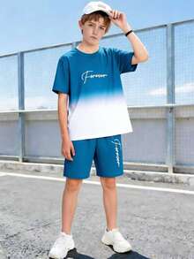 SHEIN Fantacosmos Bộ đồ thể thao 2 mảnh cho bé trai tuổi teen: Áo thun ngắn tay và quần short in chữ kiểu ombre, phong cách thường ngày. - trái cam - Xem 7