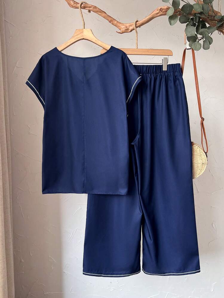 Plus Size Women Floral Print V-Neck Shirt And Wide Leg Pants 2-Piece Set For Summer/ Vacation Summer Outfits Summer Clothes  Spring  Spring Outfit Women Spring Clothes Country Style For Women