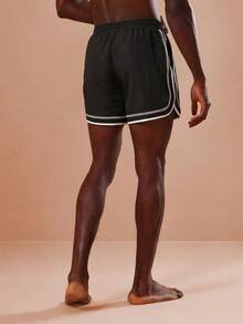 SUMWON Regular Curved Hem Beach Shorts With Contrast Trim And Logo Detail For Summer Swimming Vacation - Black - View 4