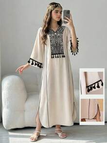 Một chiếc váy truyền thống Ả Rập với họa tiết dành cho bé gái tuổi teen và đường viền đen nhỏ cổ điển, mang phong cách áo choàng Trung Đông, vừa thoải mái, thời trang, thanh lịch và ngọt ngào. Phù hợp cho mùa hè, mặc hàng ngày và các lễ hội, cũng như các lễ hội Trung Đông. - Nhiều màu - Xem 1