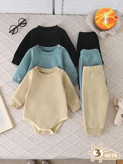 SHEIN Vintaside Kids 男婴纯色圆领长袖连体衣三件套，黑色、白色和灰色可选，简约宽松版型，适合不同体型。三件套包含一件连体衣上衣和三条无腰带长裤，适合多种场合：户外玩耍休闲自在；居家休闲舒适；运动灵活自如。秋冬季适用。
