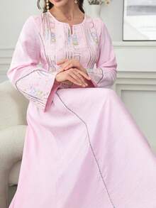 Al Najma Colorful Embroidered & Sequin Decor Flared Hem Arabic Style Dress With Round Neck & Bell Sleeves - Pink - View 5