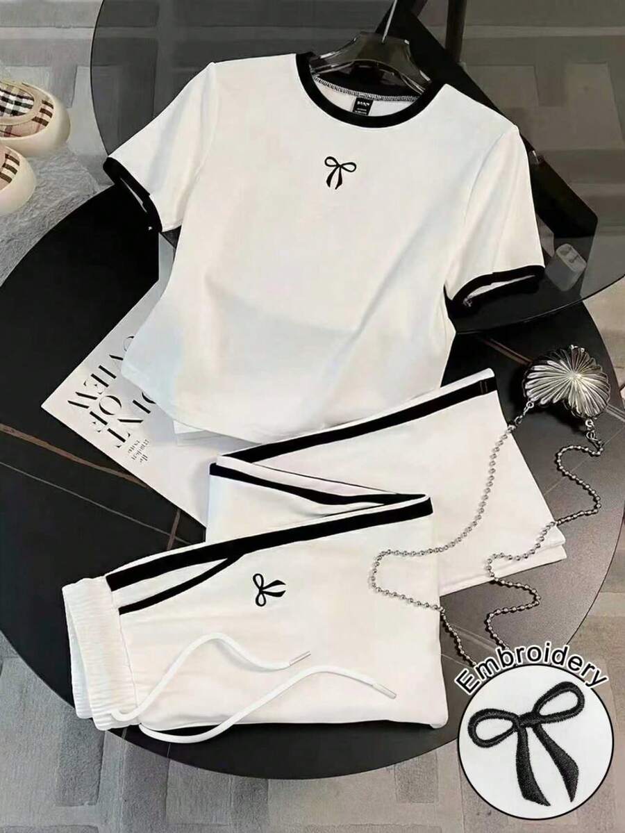 Qadelle 女士时尚休闲撞色拼接蝴蝶结刺绣短袖上衣和高腰抽绳宽松直筒裤两件套 - 黑與白 - 查看 1
